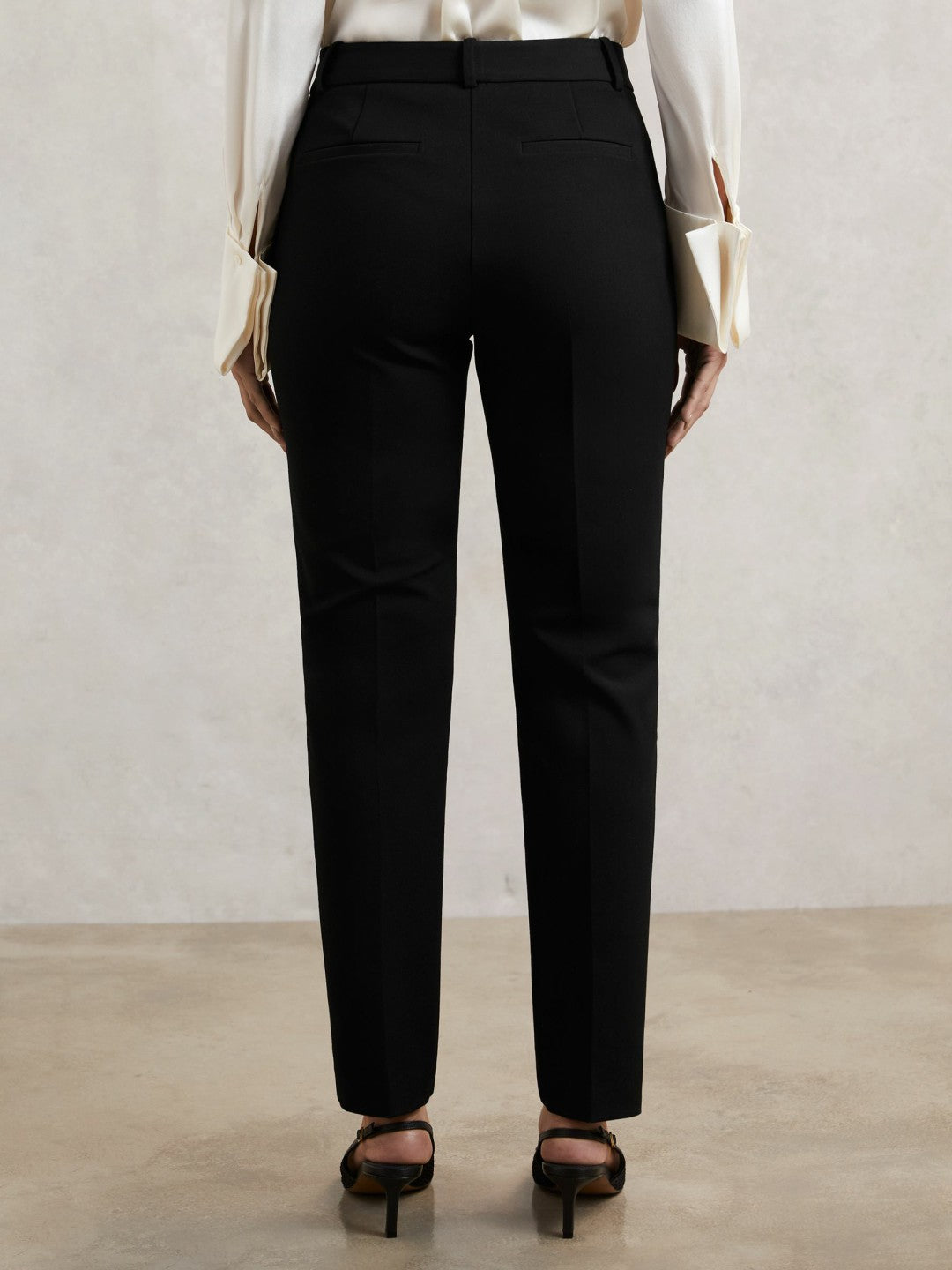 Pintuck Tapered Trousers in Black Women | Reiss