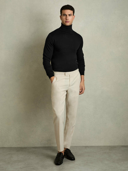 Slim Fit Merino Wool Roll Neck Jumper in Black Men | Reiss