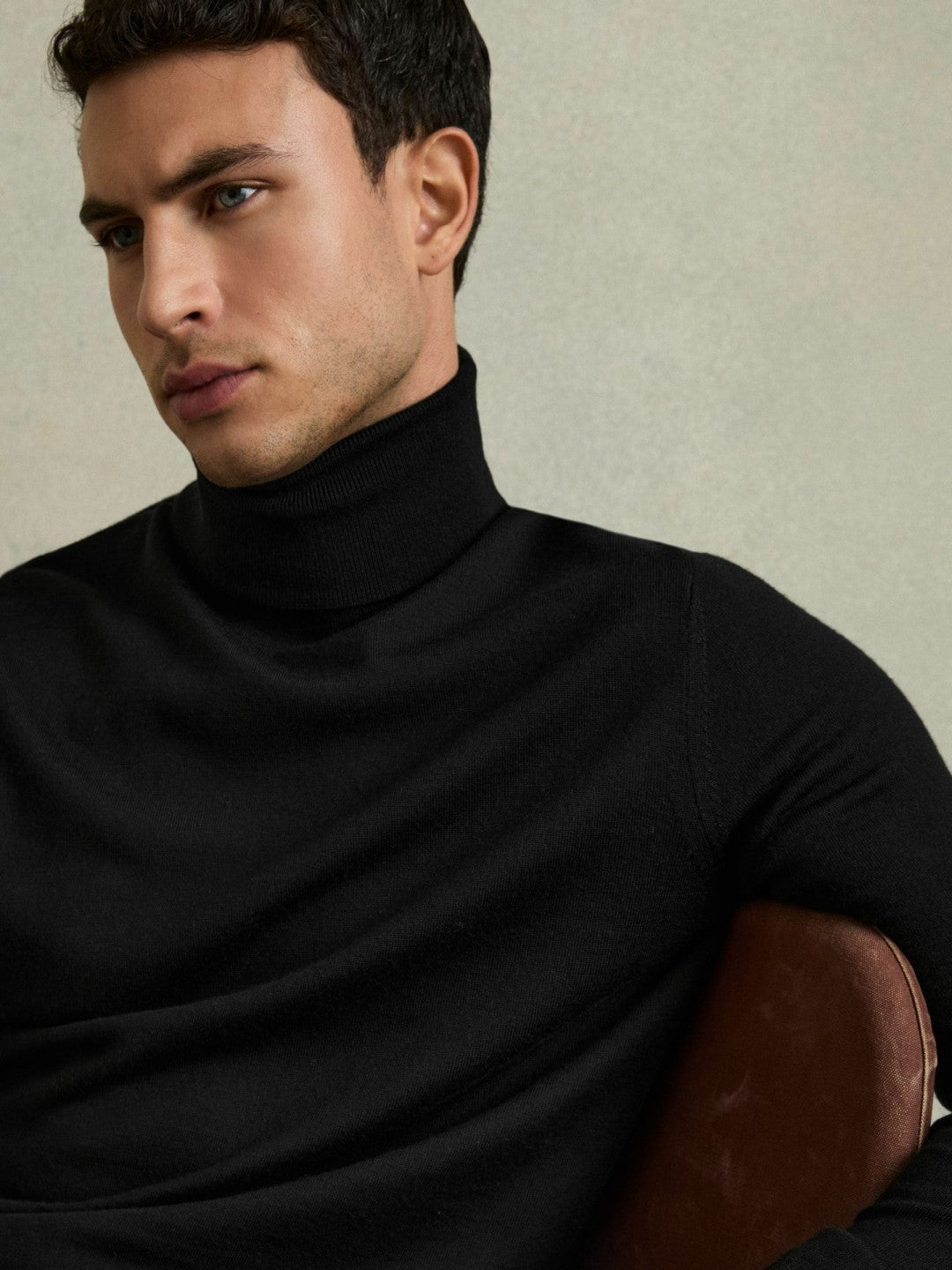 Slim Fit Merino Wool Roll Neck Jumper in Black Men | Reiss
