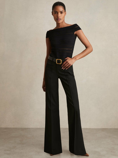 Petite High Rise Flared Trousers in Black Women | Reiss