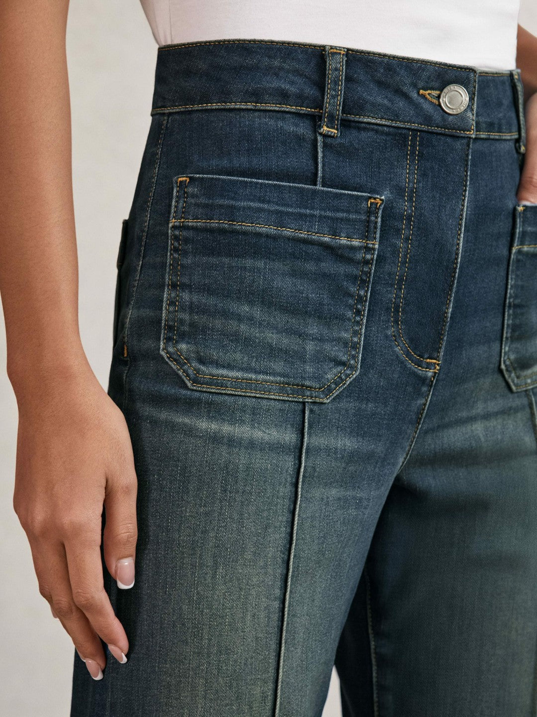 Petite Patch-Pocket Flared Jeans in Mid Blue Women | Reiss
