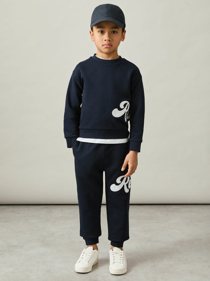 9-13 yrs Cotton-Blend Logo Script Joggers in Navy Children & Baby | Reiss