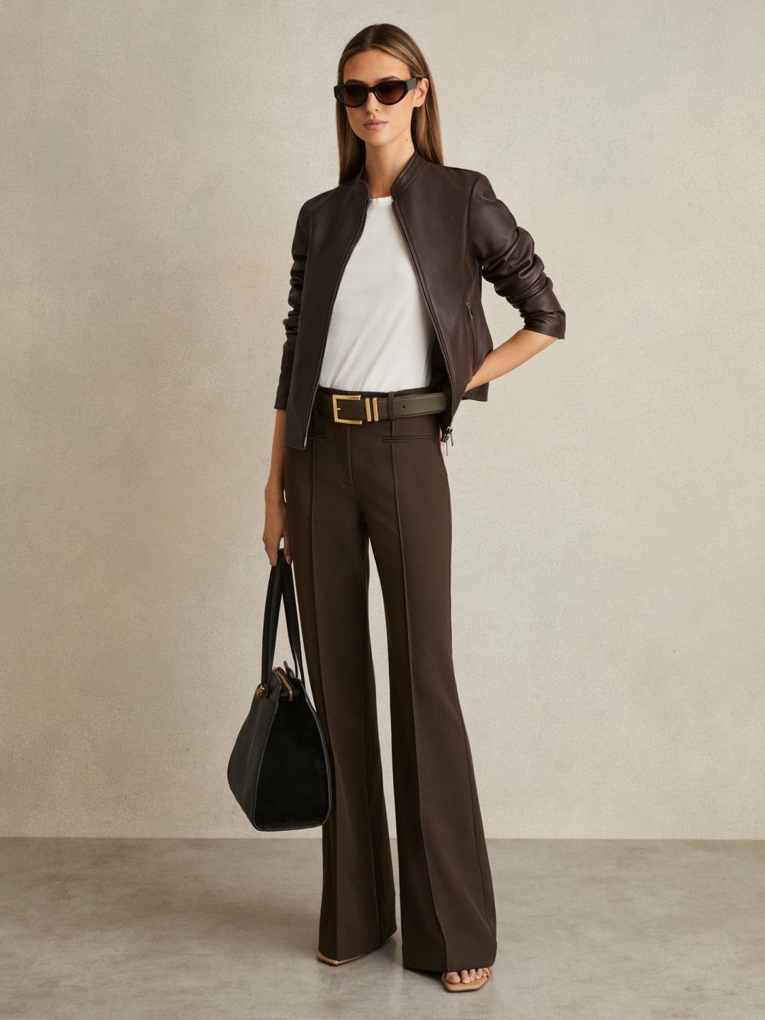 Petite High Rise Flared Trousers in Chocolate Brown Women | Reiss