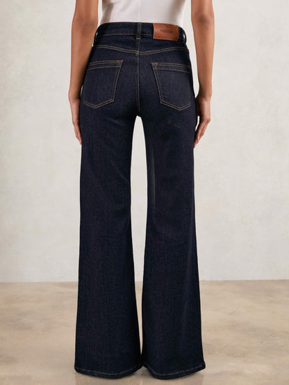 Petite Mid-Rise Flared Jeans in Dark Blue Women | Reiss