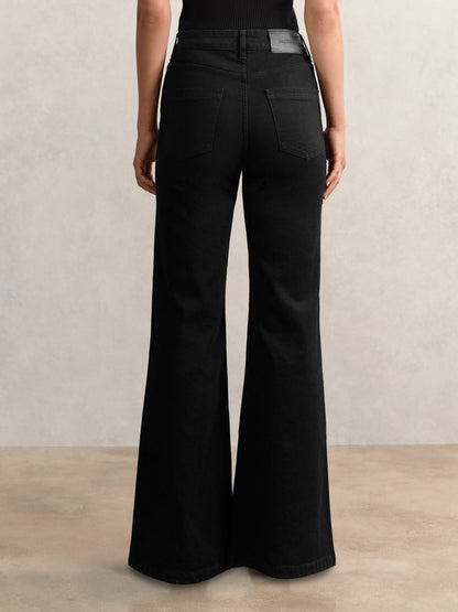 Petite Mid-Rise Flared Jeans in Black Women | Reiss