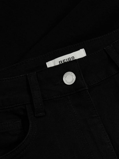 Petite Mid-Rise Flared Jeans in Black Women | Reiss