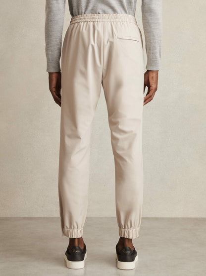 Drawstring Technical Cuffed Trousers in Stone Men | Reiss