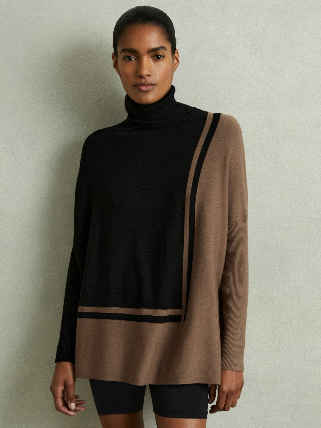 Colourblock Roll Neck Split Hem Jumper in Black/Mink Women | Reiss