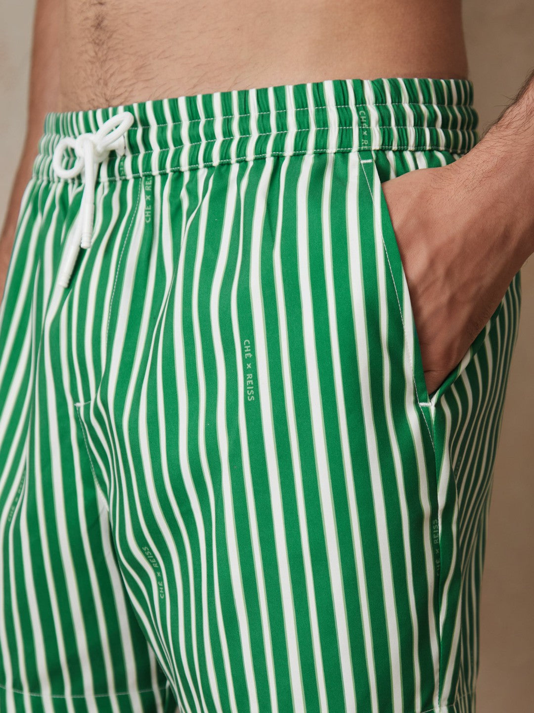 | Ché Stripe Swim Shorts in Green/White Men | Reiss