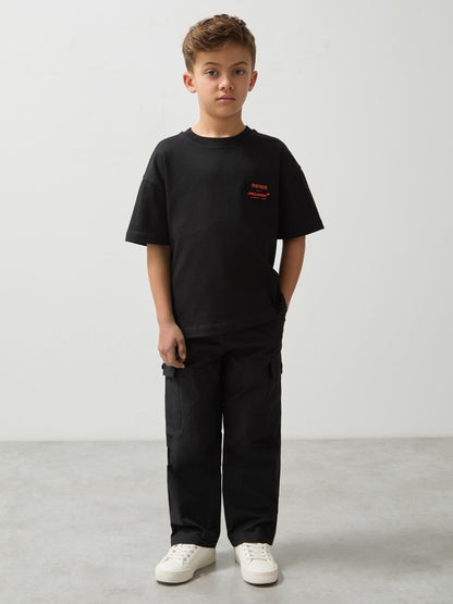 3-9 yrs Unisex Fit Oversized McLaren F1 Team Tyre T-Shirt in Black Children & Baby | Reiss