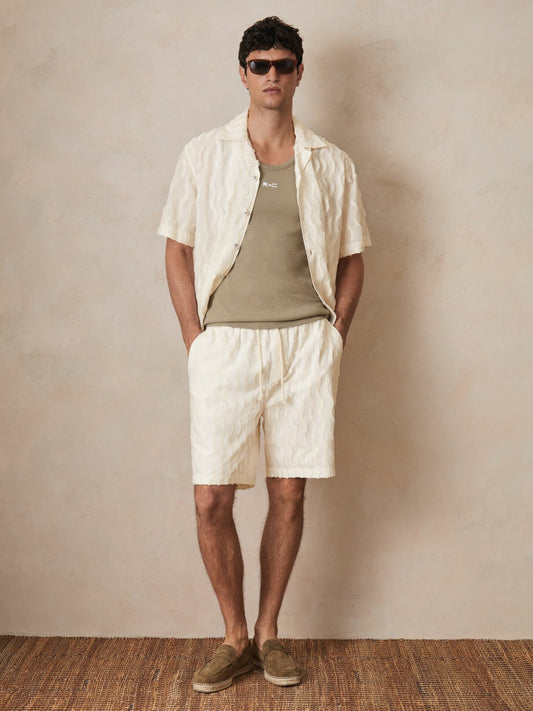 | Ché Fringed-Wave Shorts in Off White Men | Reiss