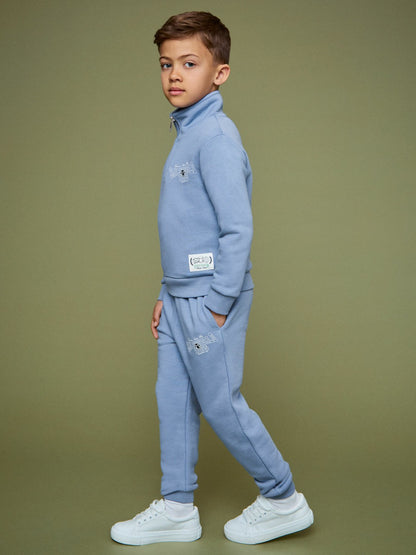9-13 yrs SmileyWorld Cuffed Joggers Unisex Fit in Blue Children & Baby | Reiss