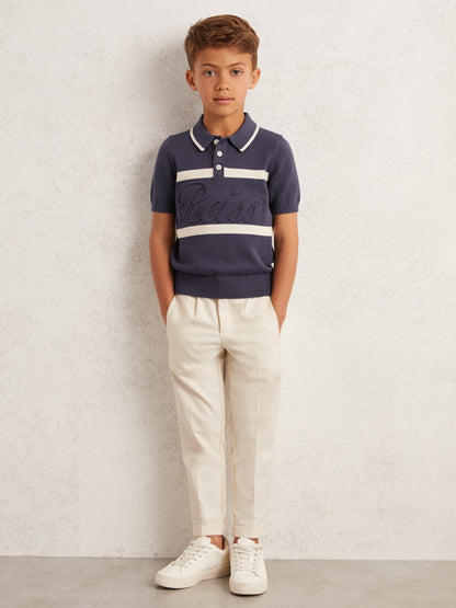9-13 yrs Cotton Logo-Embossed Knit Polo Shirt in Indigo Blue/White Children & Baby | Reiss