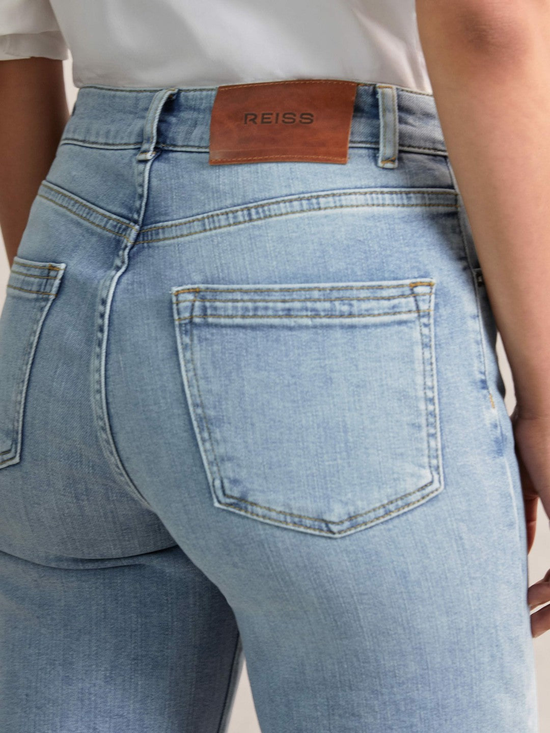 Petite Mid-Rise Flared Jeans in Light Blue Women | Reiss