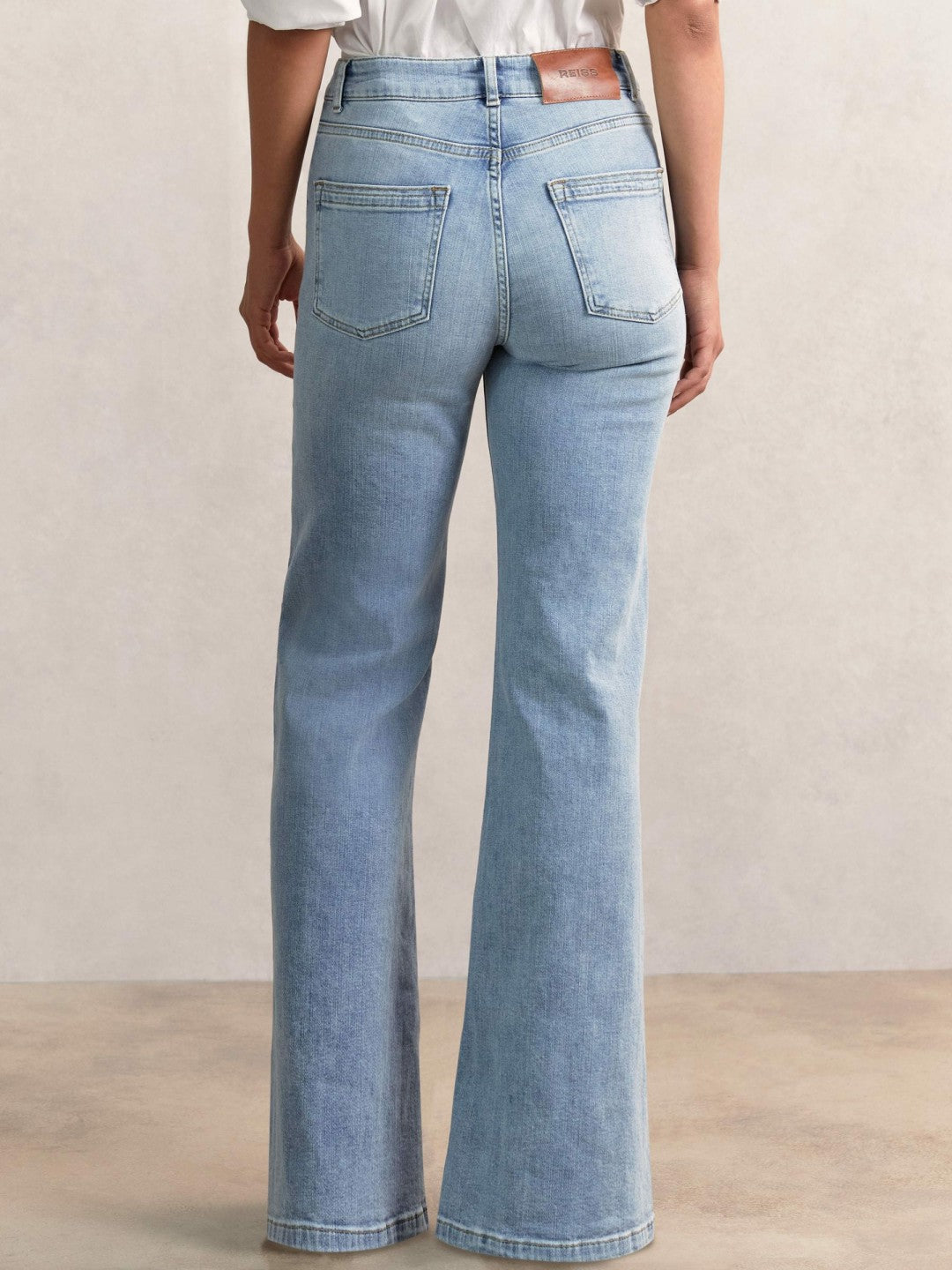 Petite Mid-Rise Flared Jeans in Light Blue Women | Reiss