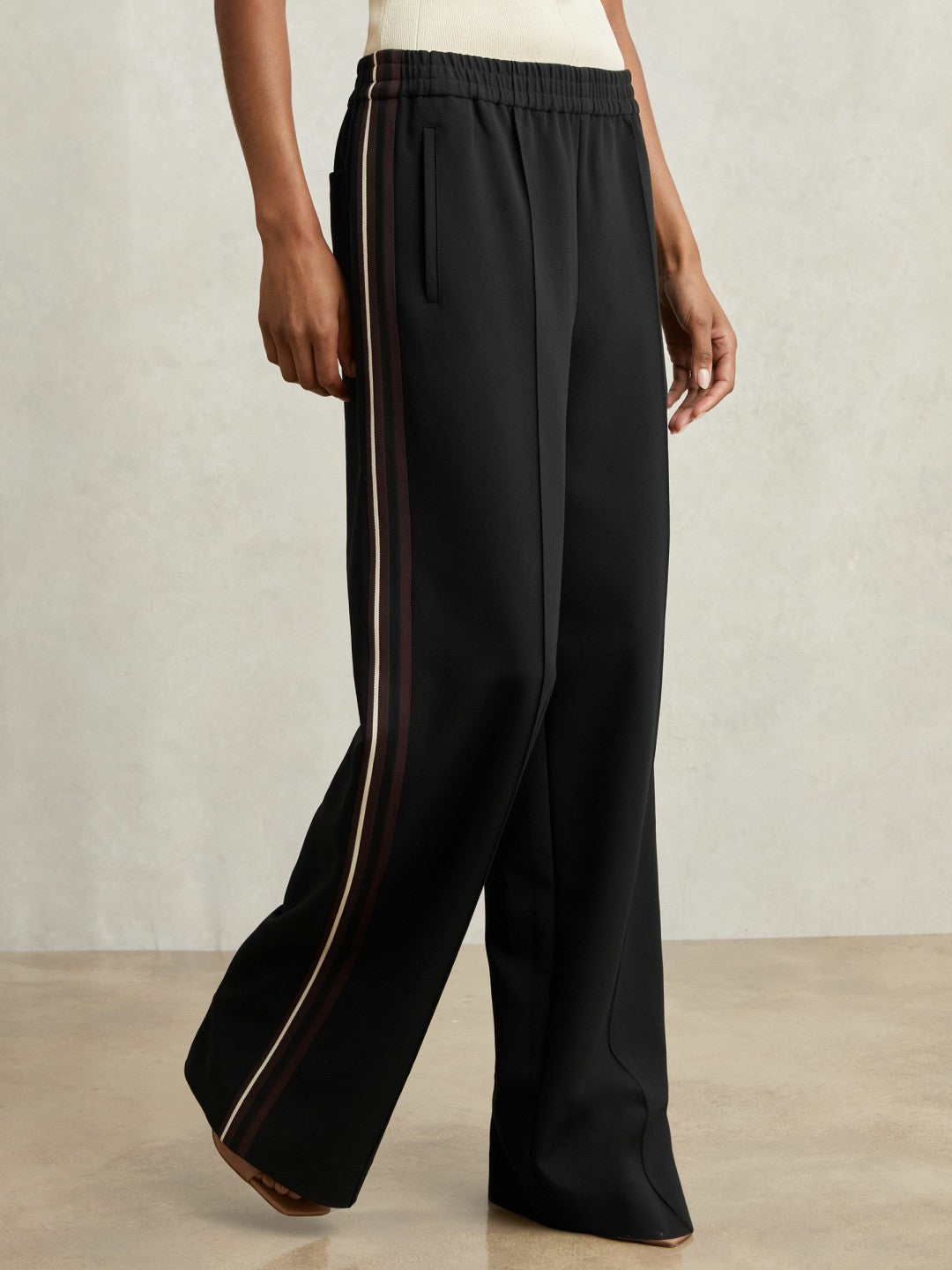 Petite Side-Stripe Wide-Leg Trousers in Black Women | Reiss