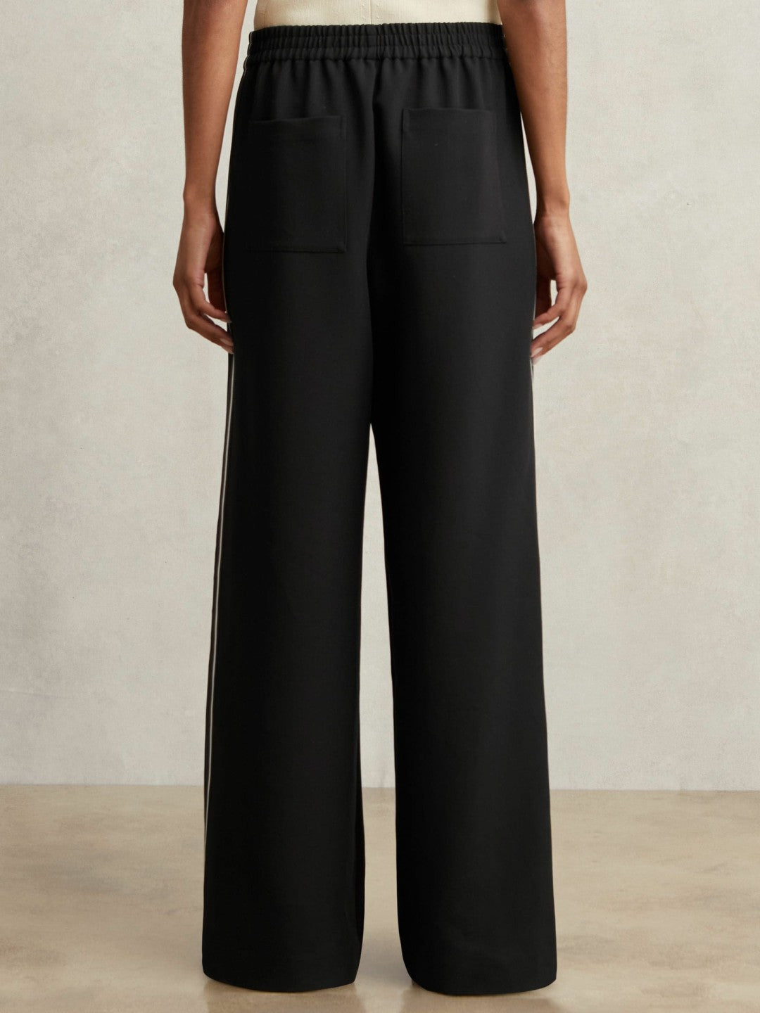 Petite Side-Stripe Wide-Leg Trousers in Black Women | Reiss