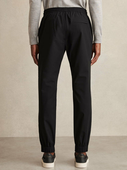 Drawstring Technical Cuffed Trousers in Black Men | Reiss