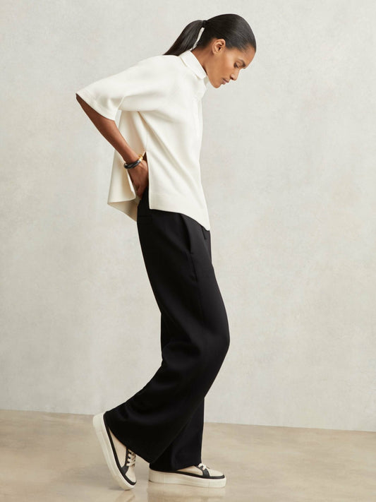 Petite Wide-Leg Interlock Drawstring Joggers in Black Women | Reiss