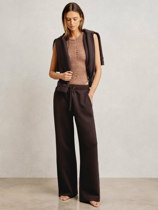 Petite Wide-Leg Interlock Drawstring Joggers in Plum Women | Reiss
