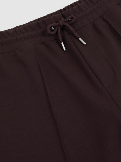Interlock Drawstring Joggers in Cherry Red Men | Reiss
