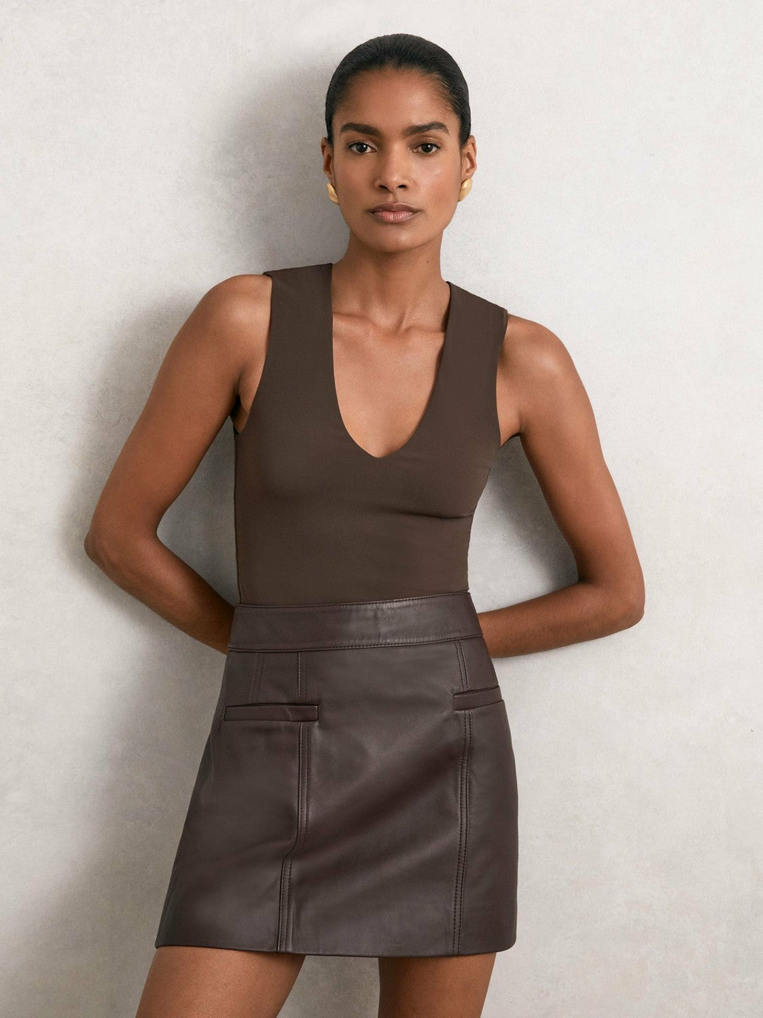 V-Neck Sleeveless Bodysuit in Chocolate Brown Women | Reiss