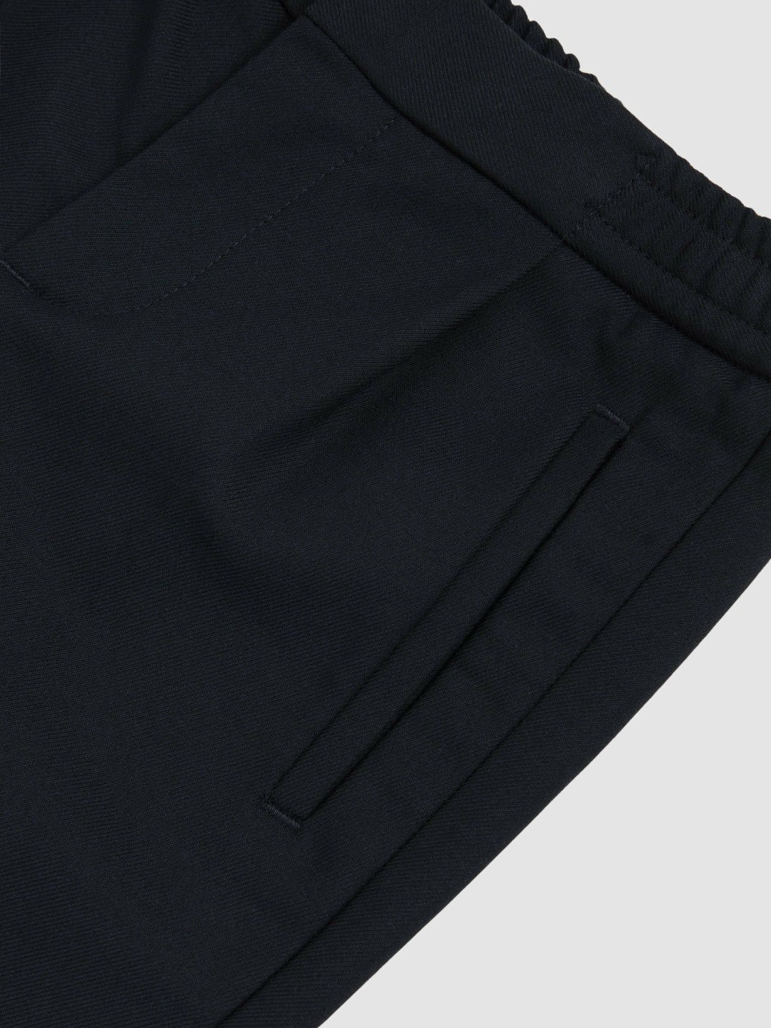 9-13 yrs Relaxed-Fit Pleated Tapered Trousers in Navy Children & Baby | Reiss
