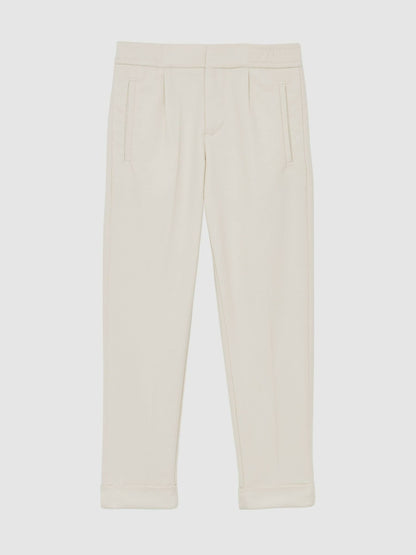 9-13 yrs Relaxed-Fit Pleated Tapered Trousers in Off White Children & Baby | Reiss