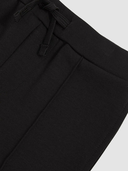 9-13 yrs Interlock Drawstring Joggers in Black Children & Baby | Reiss