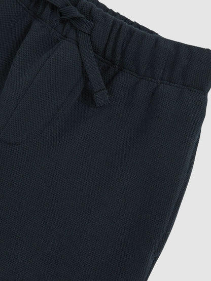 Cotton-Blend Textured Cuffed Joggers in Navy Children & Baby | Reiss