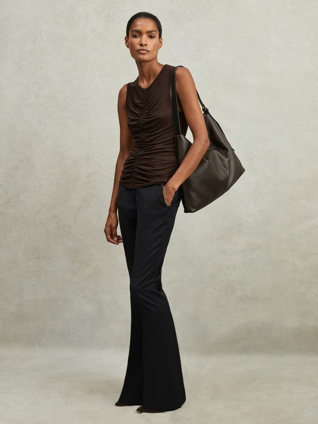 Wool-Blend Tailored Flared Suit Trousers in Navy Women | Reiss