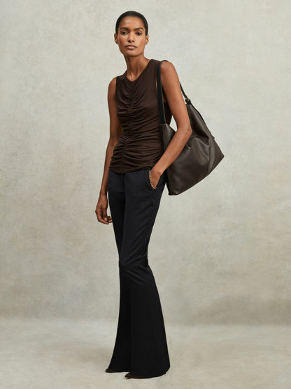 Wool-Blend Tailored Flared Suit Trousers in Navy Women | Reiss