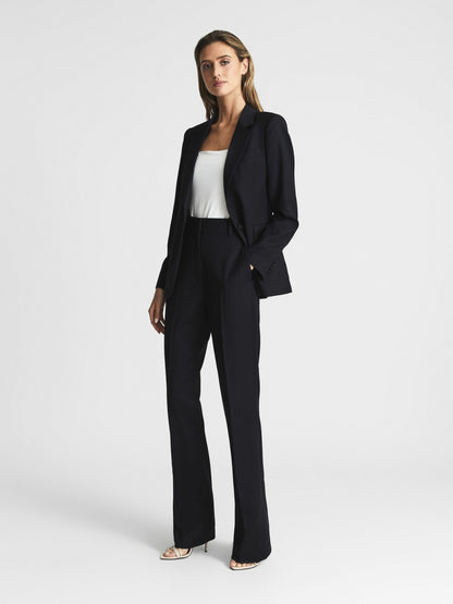Wool-Blend Tailored Flared Suit Trousers in Navy Women | Reiss