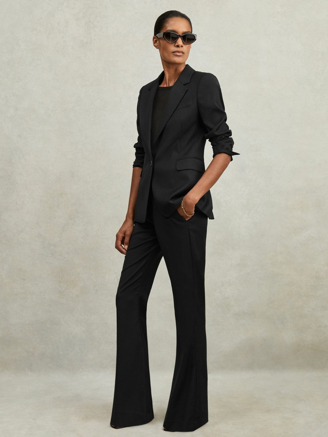 Wool-Blend Tailored Flared Suit Trousers in Black Women | Reiss