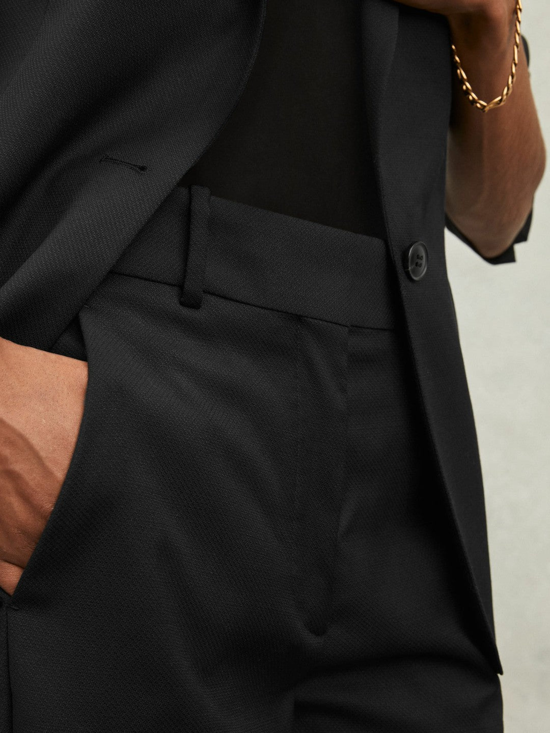 Wool-Blend Tailored Flared Suit Trousers in Black Women | Reiss