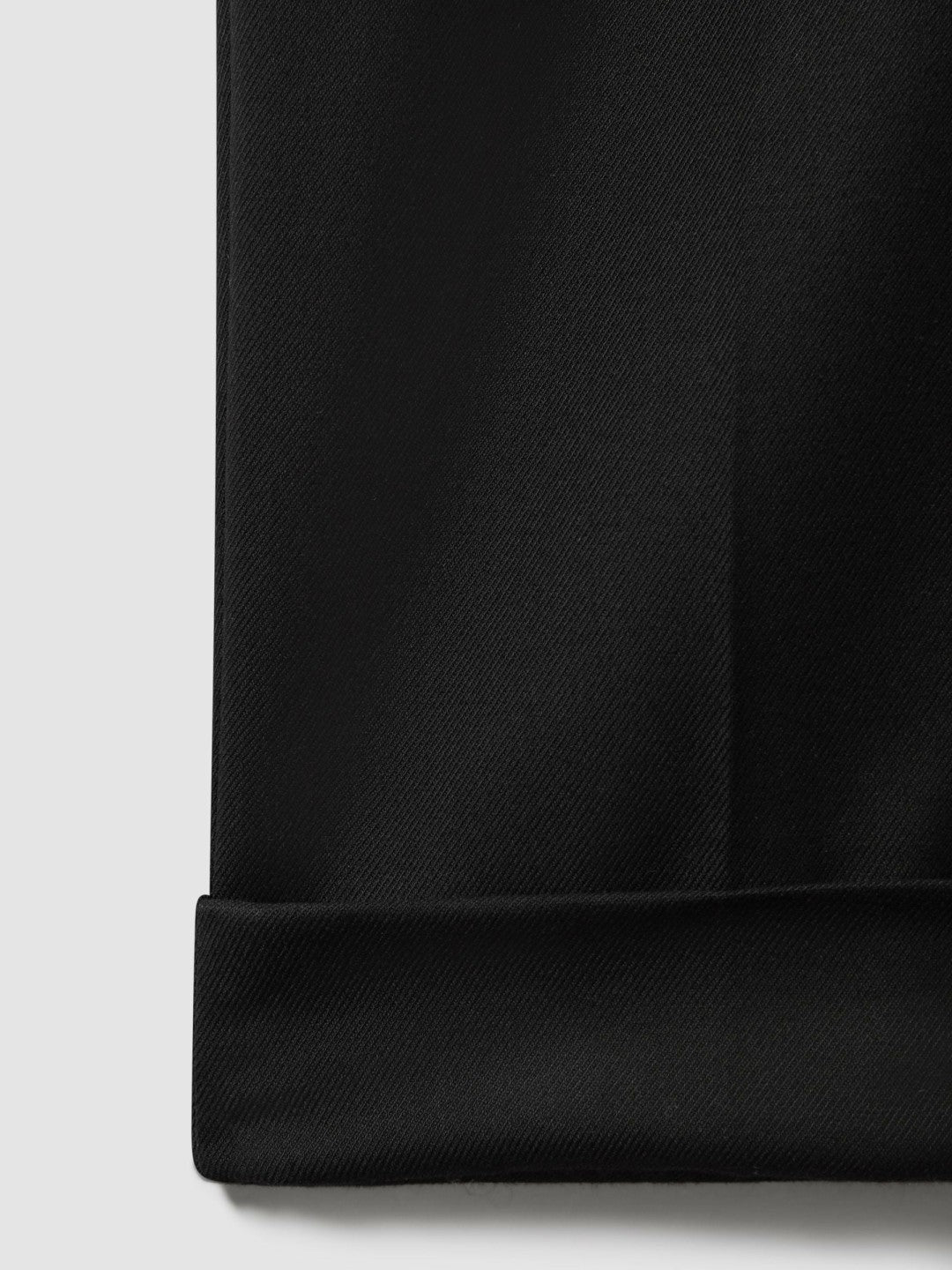 Relaxed-Fit Pleated Tapered Trousers in Black Men | Reiss