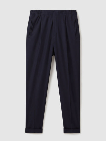 Relaxed-Fit Pleated Tapered Trousers in Navy Men | Reiss