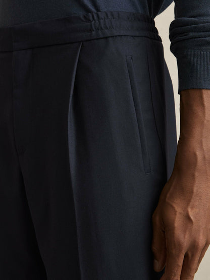 Relaxed-Fit Pleated Tapered Trousers in Navy Men | Reiss