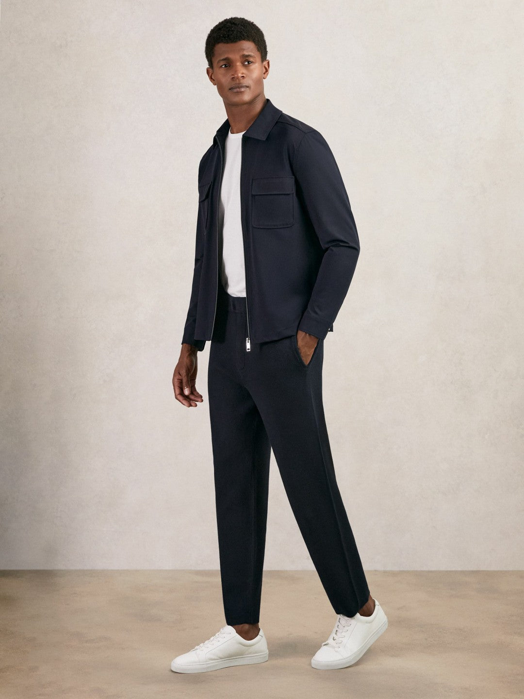 Tapered Knitted Trousers in Navy Men | Reiss