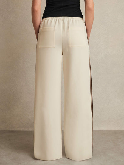 Side-Stripe Wide-Leg Trousers in Cream Women | Reiss