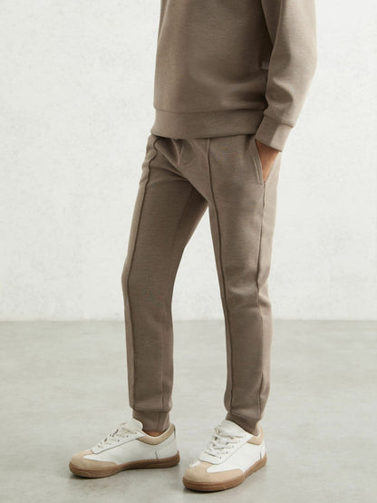 3-9 yrs Interlock Drawstring Joggers in Taupe Brown Children & Baby | Reiss