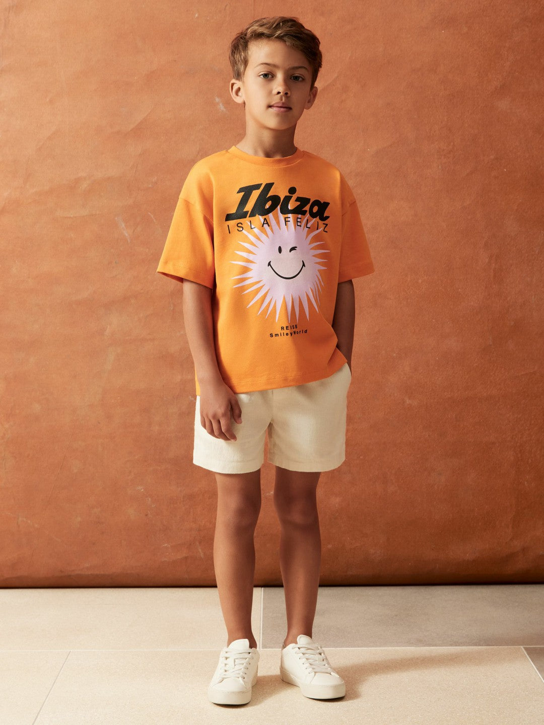 3-9 yrs SmileyWorld Sun Motif T-Shirt in Orange Children & Baby | Reiss
