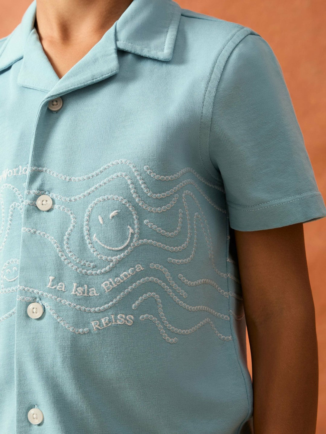 3-9 yrs SmileyWorld Embroidered Shirt in Sky Blue Children & Baby | Reiss