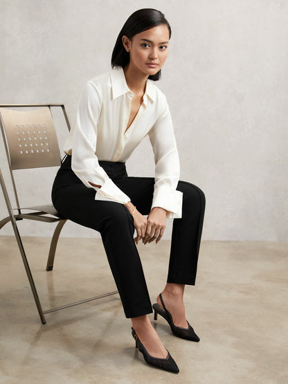 Petite Pintuck Tapered Trousers in Black Women | Reiss