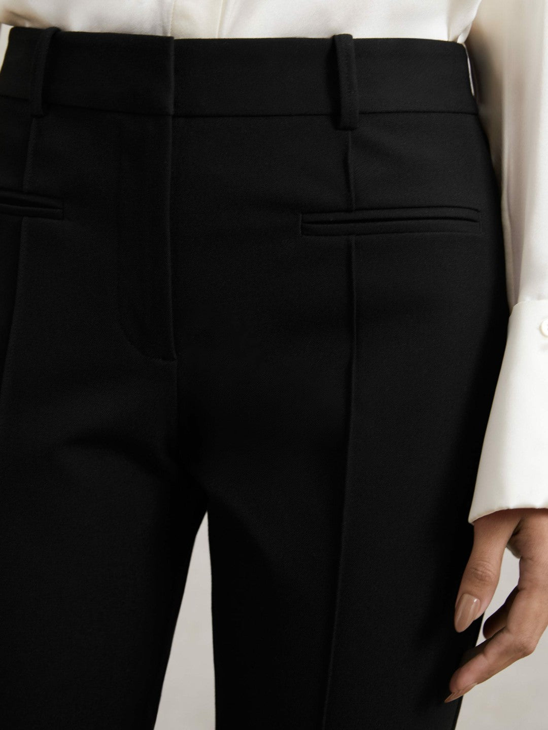 Petite Pintuck Tapered Trousers in Black Women | Reiss