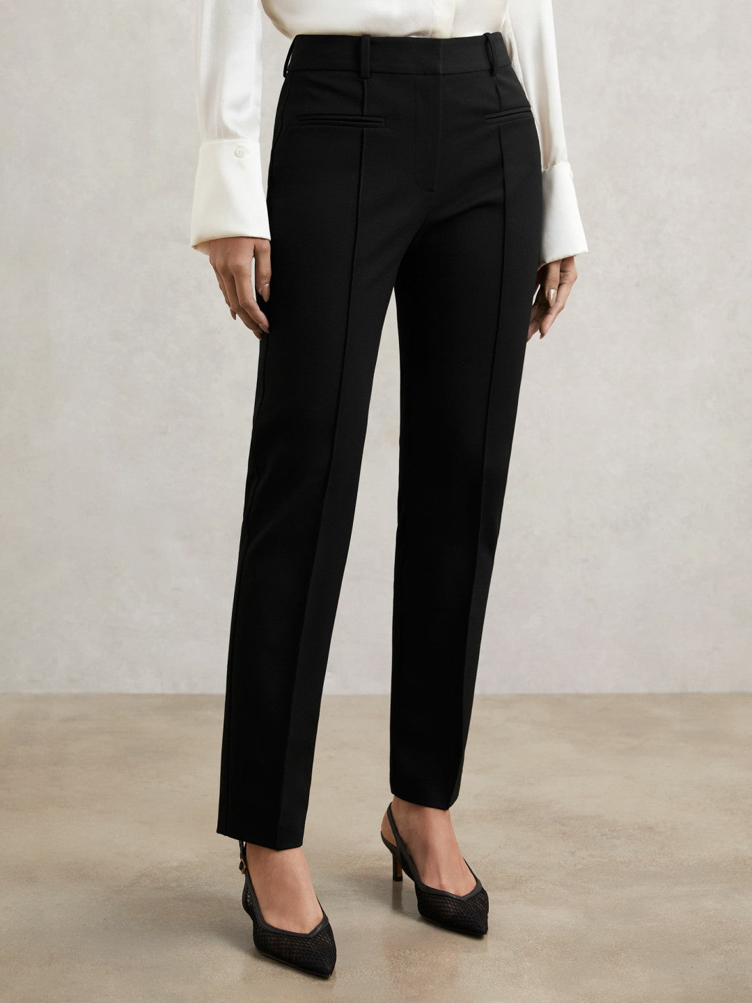Petite Pintuck Tapered Trousers in Black Women | Reiss