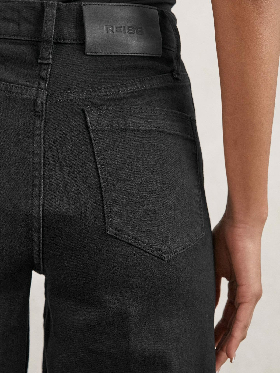 Petite Stretch-Cotton Wide-Leg Jeans in Black Women | Reiss